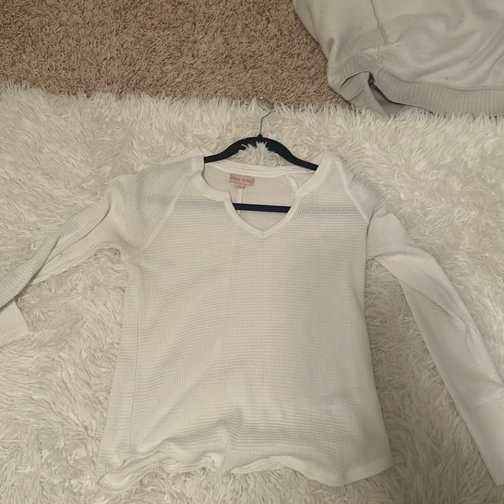 White sweater from target. It is a small but runs a little big!